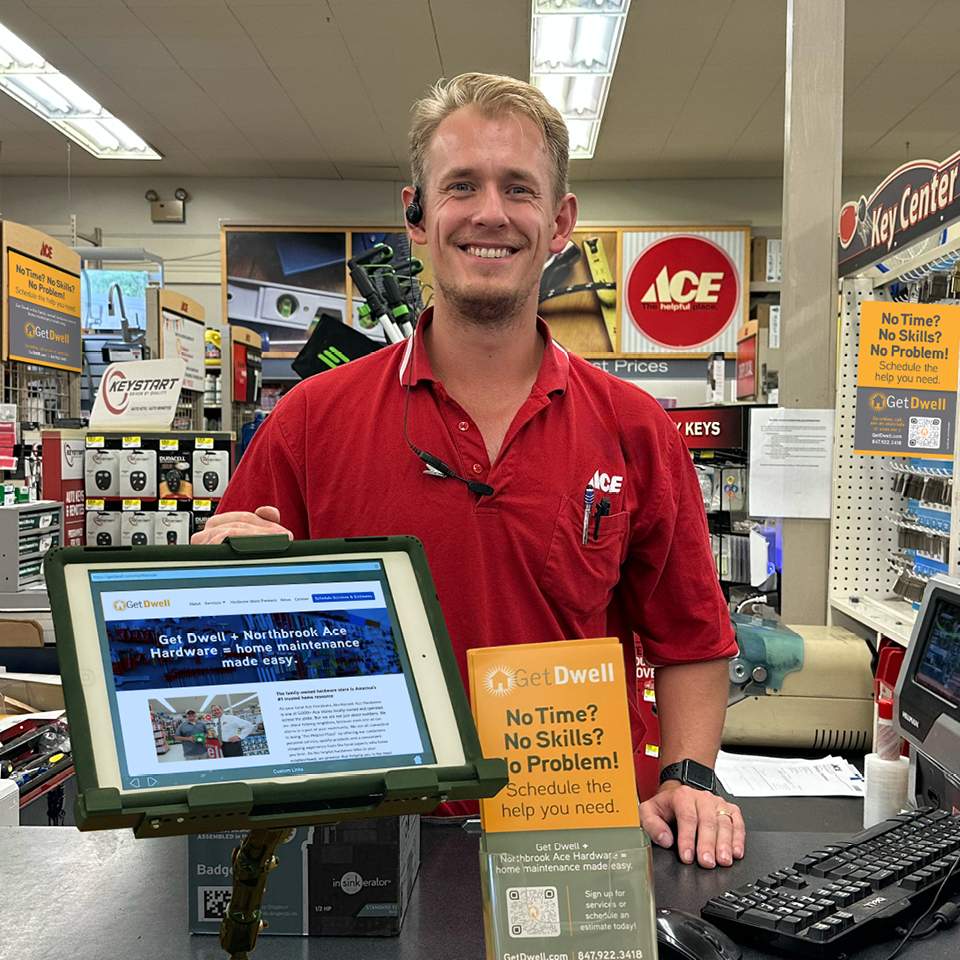 Northbrook Ace Hardware Store with Get Dwell merchandising and a smiling business owner wearing a red shirt.